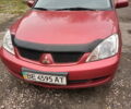 Червоний Міцубісі Lancer, об'ємом двигуна 1.6 л та пробігом 217 тис. км за 3750 $, фото 1 на Automoto.ua