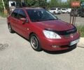 Красный Мицубиси Лансер, объемом двигателя 1.58 л и пробегом 350 тыс. км за 4100 $, фото 1 на Automoto.ua
