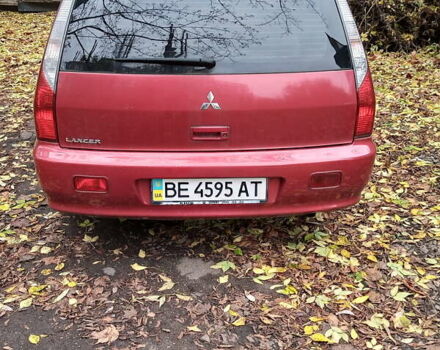 Красный Мицубиси Лансер, объемом двигателя 1.6 л и пробегом 217 тыс. км за 3750 $, фото 3 на Automoto.ua