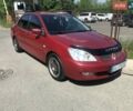 Червоний Міцубісі Lancer, об'ємом двигуна 1.58 л та пробігом 350 тис. км за 4100 $, фото 1 на Automoto.ua