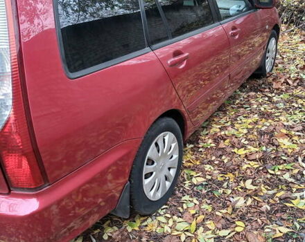 Красный Мицубиси Лансер, объемом двигателя 1.6 л и пробегом 217 тыс. км за 3750 $, фото 2 на Automoto.ua