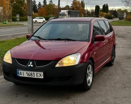 Красный Мицубиси Лансер, объемом двигателя 1.6 л и пробегом 290 тыс. км за 2800 $, фото 1 на Automoto.ua