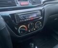 Красный Мицубиси Лансер, объемом двигателя 1.6 л и пробегом 245 тыс. км за 4300 $, фото 11 на Automoto.ua