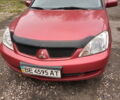 Червоний Міцубісі Lancer, об'ємом двигуна 1.6 л та пробігом 217 тис. км за 3750 $, фото 1 на Automoto.ua