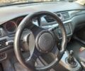 Красный Мицубиси Лансер, объемом двигателя 1.6 л и пробегом 280 тыс. км за 4000 $, фото 8 на Automoto.ua