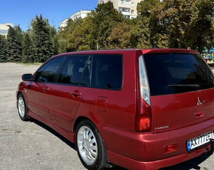 Красный Мицубиси Лансер, объемом двигателя 1.6 л и пробегом 244 тыс. км за 3900 $, фото 5 на Automoto.ua