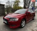 Красный Мицубиси Лансер, объемом двигателя 1.8 л и пробегом 175 тыс. км за 5500 $, фото 1 на Automoto.ua