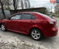 Красный Мицубиси Лансер, объемом двигателя 1.8 л и пробегом 175 тыс. км за 5500 $, фото 1 на Automoto.ua