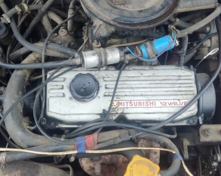 Красный Мицубиси Лансер, объемом двигателя 0 л и пробегом 460 тыс. км за 286 $, фото 1 на Automoto.ua