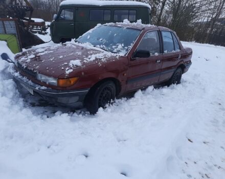 Червоний Міцубісі Lancer, об'ємом двигуна 1 л та пробігом 21 тис. км за 700 $, фото 1 на Automoto.ua