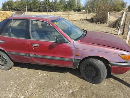 Червоний Міцубісі Lancer, об'ємом двигуна 1.4 л та пробігом 450 тис. км за 400 $, фото 1 на Automoto.ua