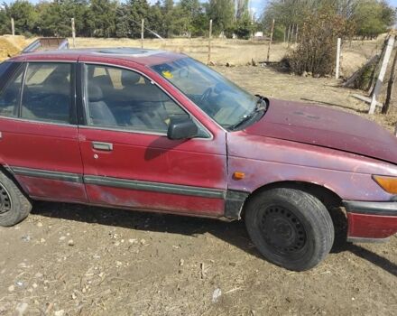 Червоний Міцубісі Lancer, об'ємом двигуна 1.4 л та пробігом 450 тис. км за 400 $, фото 1 на Automoto.ua
