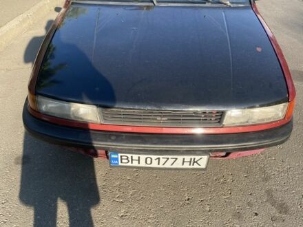 Міцубісі Lancer 1991 у Одесі на Automoto.ua Червоний Міцубісі Lancer, об'ємом двигуна 1.3 л та пробігом 300 тис. км за 600 $, фото 1 на Automoto.ua