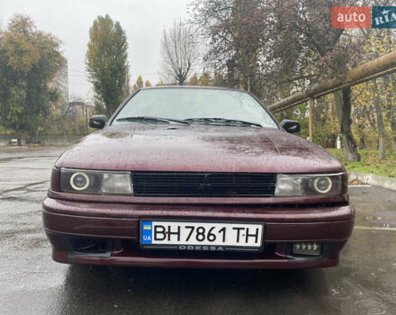 Красный Мицубиси Лансер, объемом двигателя 1.2 л и пробегом 220 тыс. км за 1300 $, фото 1 на Automoto.ua