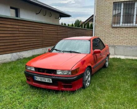 Червоний Міцубісі Lancer, об'ємом двигуна 1.8 л та пробігом 435 тис. км за 1000 $, фото 1 на Automoto.ua
