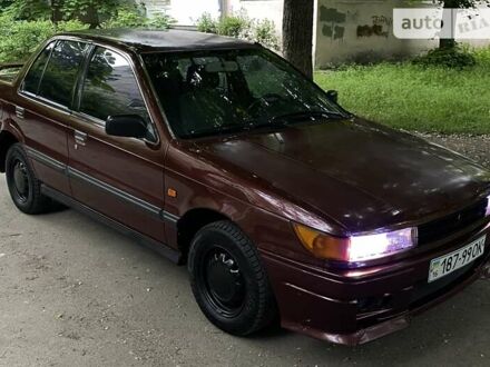 Червоний Міцубісі Lancer, об'ємом двигуна 1.5 л та пробігом 267 тис. км за 1350 $, фото 1 на Automoto.ua