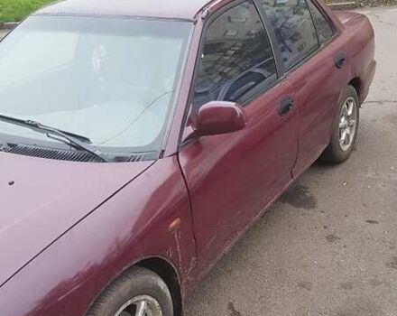 Червоний Міцубісі Lancer, об'ємом двигуна 1.6 л та пробігом 362 тис. км за 1700 $, фото 1 на Automoto.ua