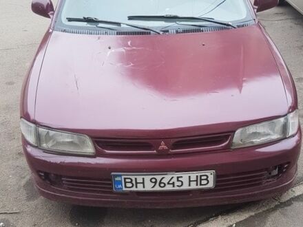 Красный Мицубиси Лансер, объемом двигателя 1.6 л и пробегом 362 тыс. км за 1700 $, фото 1 на Automoto.ua