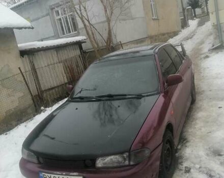 Червоний Міцубісі Lancer, об'ємом двигуна 1.6 л та пробігом 220 тис. км за 1250 $, фото 1 на Automoto.ua