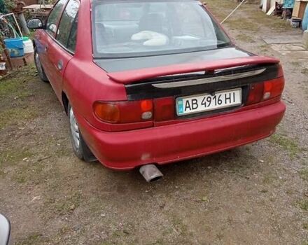 Червоний Міцубісі Lancer, об'ємом двигуна 1.3 л та пробігом 450 тис. км за 1100 $, фото 1 на Automoto.ua