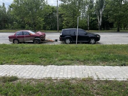Мицубиси Лансер 1996 в Скадовске на Automoto.ua Красный Мицубиси Лансер, объемом двигателя 1.5 л и пробегом 111 тыс. км за 600 $, фото 1 на Automoto.ua