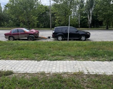 Червоний Міцубісі Lancer, об'ємом двигуна 1.5 л та пробігом 111 тис. км за 600 $, фото 1 на Automoto.ua