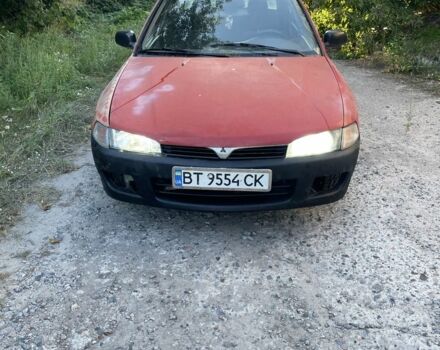 Червоний Міцубісі Lancer, об'ємом двигуна 1.3 л та пробігом 450 тис. км за 850 $, фото 1 на Automoto.ua