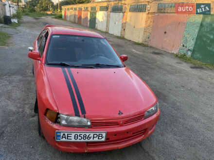 Мицубиси Лансер 1996 в Киеве на Automoto.ua Красный Мицубиси Лансер, объемом двигателя 1.3 л и пробегом 330 тыс. км за 1200 $, фото 1 на Automoto.ua