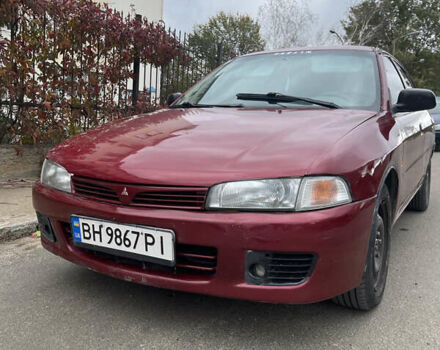 Червоний Міцубісі Lancer, об'ємом двигуна 1.3 л та пробігом 409 тис. км за 1650 $, фото 1 на Automoto.ua