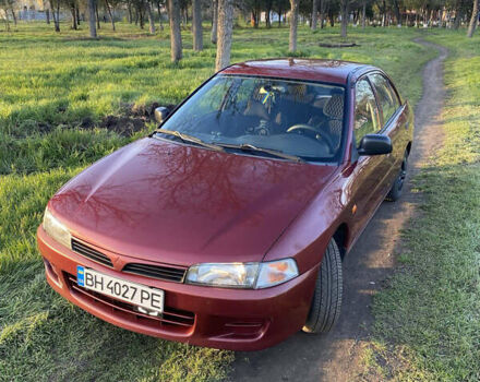 Червоний Міцубісі Lancer, об'ємом двигуна 1.3 л та пробігом 182 тис. км за 3450 $, фото 1 на Automoto.ua