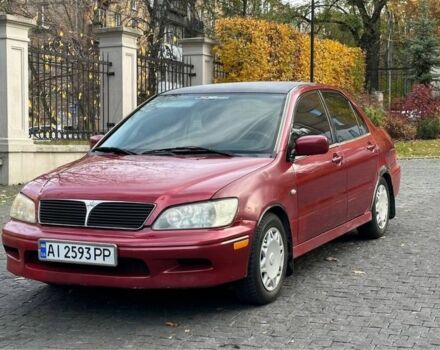 Червоний Міцубісі Lancer, об'ємом двигуна 2 л та пробігом 350 тис. км за 3399 $, фото 1 на Automoto.ua