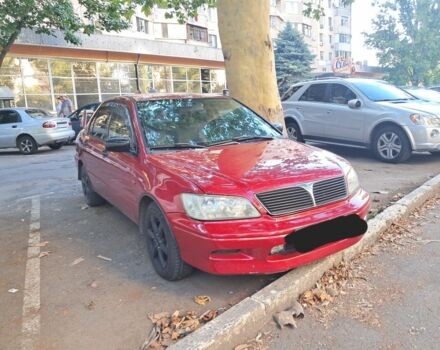 Червоний Міцубісі Lancer, об'ємом двигуна 2 л та пробігом 202 тис. км за 3300 $, фото 1 на Automoto.ua