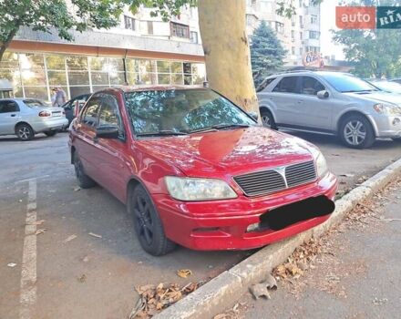 Червоний Міцубісі Lancer, об'ємом двигуна 2 л та пробігом 219 тис. км за 3800 $, фото 1 на Automoto.ua