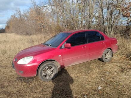 Мицубиси Лансер 2003 в Харькове на Automoto.ua Красный Мицубиси Лансер, объемом двигателя 1.6 л и пробегом 302 тыс. км за 3800 $, фото 1 на Automoto.ua
