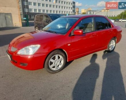 Червоний Міцубісі Lancer, об'ємом двигуна 1.58 л та пробігом 350 тис. км за 3100 $, фото 1 на Automoto.ua