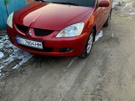 Мицубиси Лансер 2003 в Зенькове на Automoto.ua Красный Мицубиси Лансер, объемом двигателя 1.6 л и пробегом 298 тыс. км за 4700 $, фото 1 на Automoto.ua