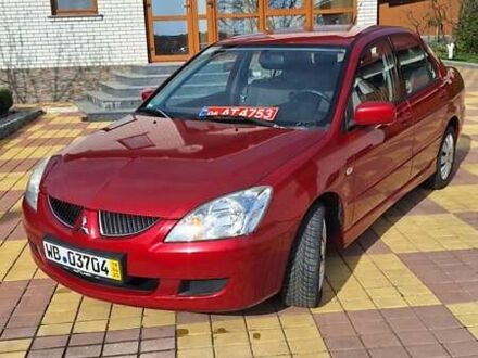 Мицубиси Лансер 2004 в Житомире на Automoto.ua Красный Мицубиси Лансер, объемом двигателя 1.58 л и пробегом 245 тыс. км за 4200 $, фото 1 на Automoto.ua