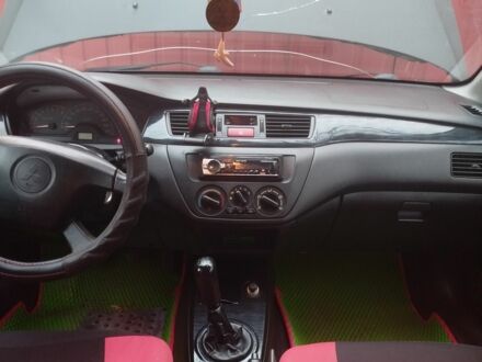 Червоний Міцубісі Lancer, об'ємом двигуна 1.6 л та пробігом 260 тис. км за 3000 $, фото 1 на Automoto.ua