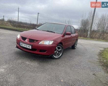 Червоний Міцубісі Lancer, об'ємом двигуна 1.3 л та пробігом 250 тис. км за 3450 $, фото 1 на Automoto.ua