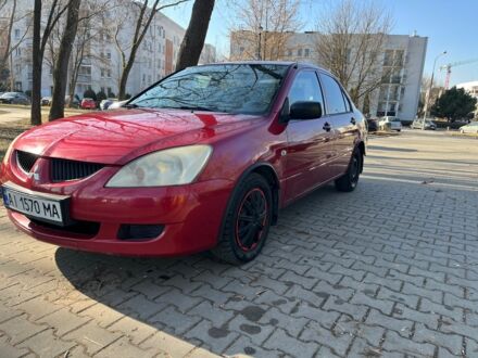 Міцубісі Lancer 2004 у Києві на Automoto.ua Червоний Міцубісі Lancer, об'ємом двигуна 1.3 л та пробігом 316 тис. км за 3200 $, фото 1 на Automoto.ua