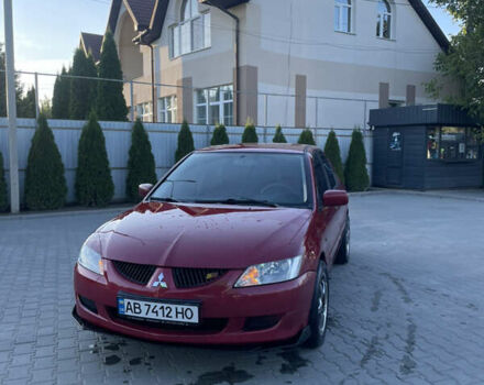 Червоний Міцубісі Lancer, об'ємом двигуна 1.3 л та пробігом 219 тис. км за 3600 $, фото 1 на Automoto.ua