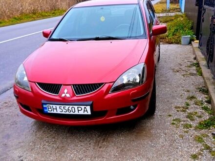 Мицубиси Лансер 2004 в Вилково на Automoto.ua Красный Мицубиси Лансер, объемом двигателя 1.6 л и пробегом 194 тыс. км за 4200 $, фото 1 на Automoto.ua