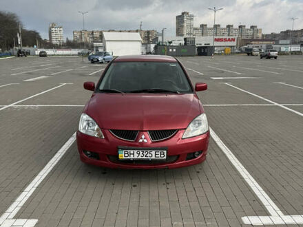 Красный Мицубиси Лансер, объемом двигателя 1.58 л и пробегом 271 тыс. км за 4100 $, фото 1 на Automoto.ua