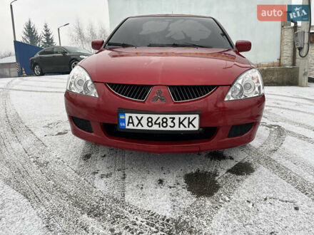 Мицубиси Лансер 2004 в Харькове на Automoto.ua Красный Мицубиси Лансер, объемом двигателя 1.58 л и пробегом 355 тыс. км за 4350 $, фото 1 на Automoto.ua