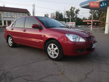 Красный Мицубиси Лансер, объемом двигателя 1.58 л и пробегом 250 тыс. км за 2999 $, фото 1 на Automoto.ua