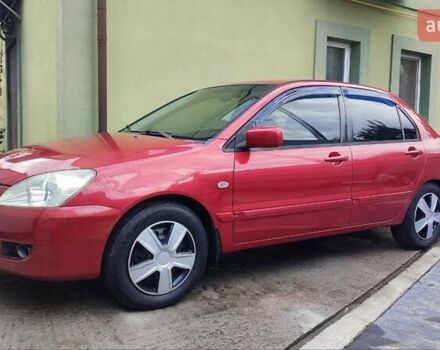 Червоний Міцубісі Lancer, об'ємом двигуна 1.58 л та пробігом 188 тис. км за 4900 $, фото 1 на Automoto.ua