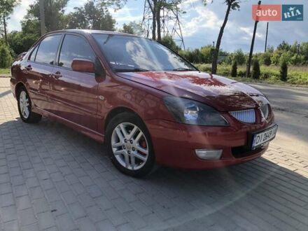 Міцубісі Lancer 2005 у Тростянце на Automoto.ua Червоний Міцубісі Lancer, об'ємом двигуна 2 л та пробігом 214 тис. км за 5400 $, фото 1 на Automoto.ua