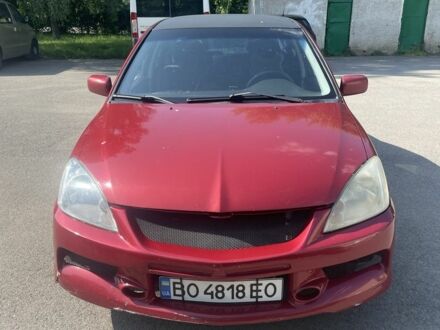 Міцубісі Lancer 2005 у Тернополі на Automoto.ua Червоний Міцубісі Lancer, об'ємом двигуна 1.6 л та пробігом 312 тис. км за 4000 $, фото 1 на Automoto.ua