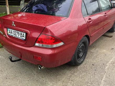 Міцубісі Lancer 2005 у Києві на Automoto.ua Червоний Міцубісі Lancer, об'ємом двигуна 1.58 л та пробігом 291 тис. км за 2900 $, фото 1 на Automoto.ua