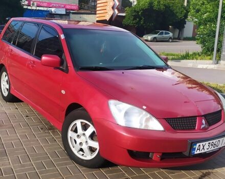 Червоний Міцубісі Lancer, об'ємом двигуна 1.6 л та пробігом 240 тис. км за 2000 $, фото 1 на Automoto.ua